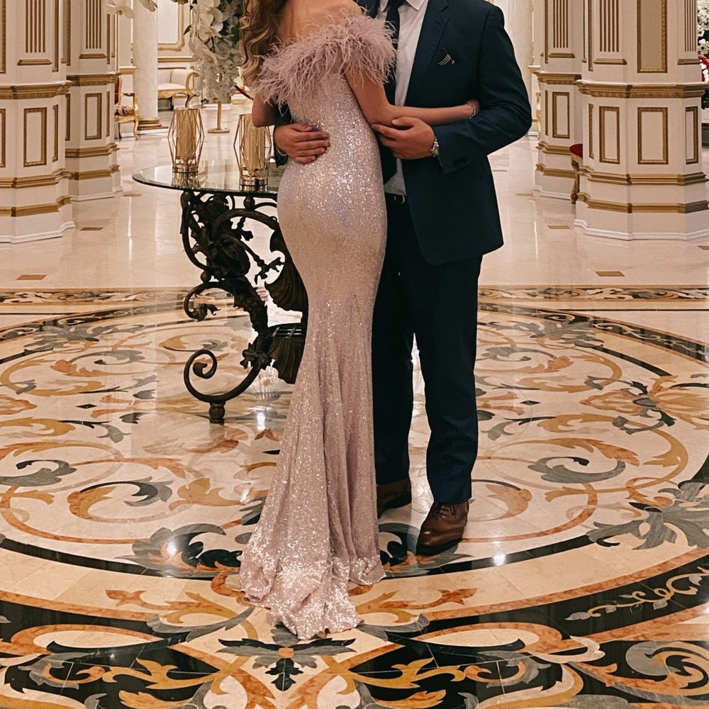 Jovani light purple sequence gown with feathers